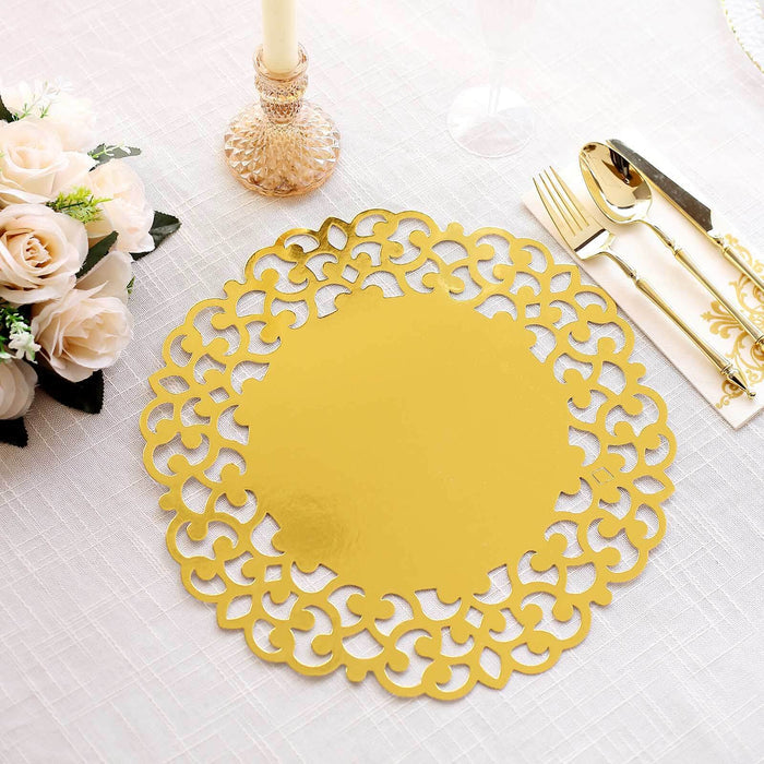 Gold decorative table placemat on a textured table with floral arrangement.