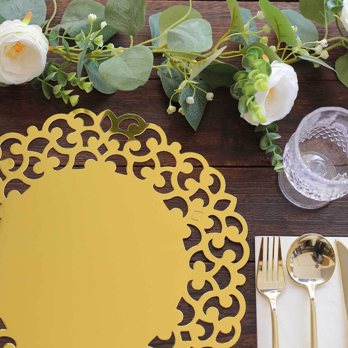 Gold decorative placemat with floral arrangement and tableware.