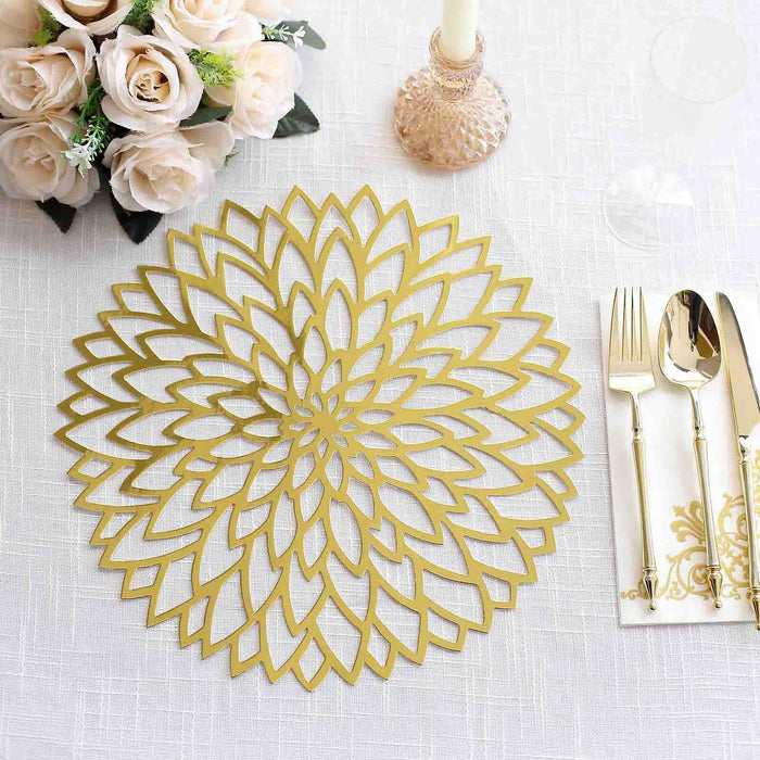 Gold floral table centerpiece with cutout design, elegantly styled.