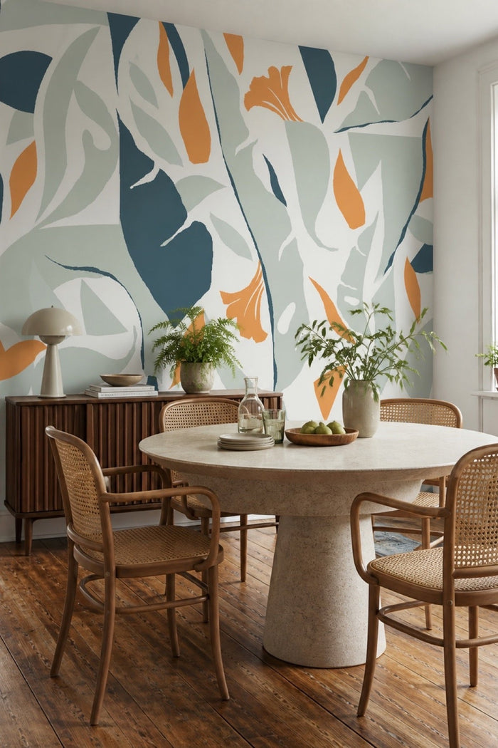 Abstract Jungle Mix wall mural in a dining room with rattan chairs and a round stone table