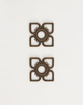 Two decorative bronze squares, em0040
