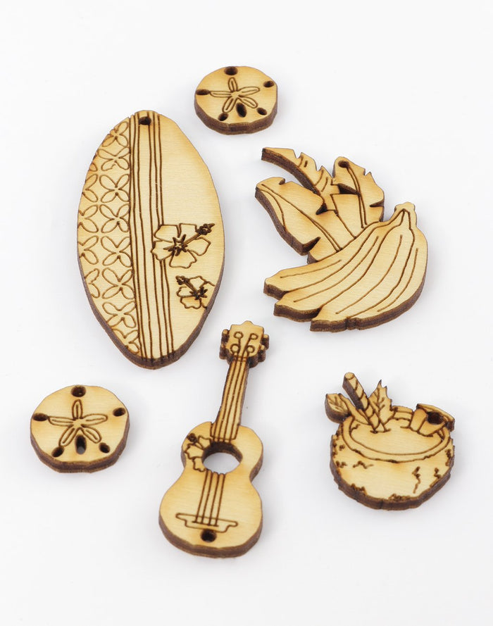 Wooden Hawaiian-themed shapes (surfboard, bananas, etc.)