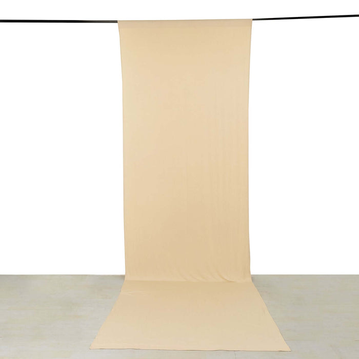 Beige seamless backdrop for photography, ideal for studio use.