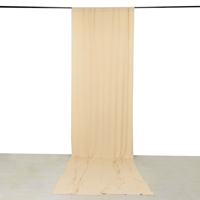 Beige fabric backdrop for photography or staging purposes