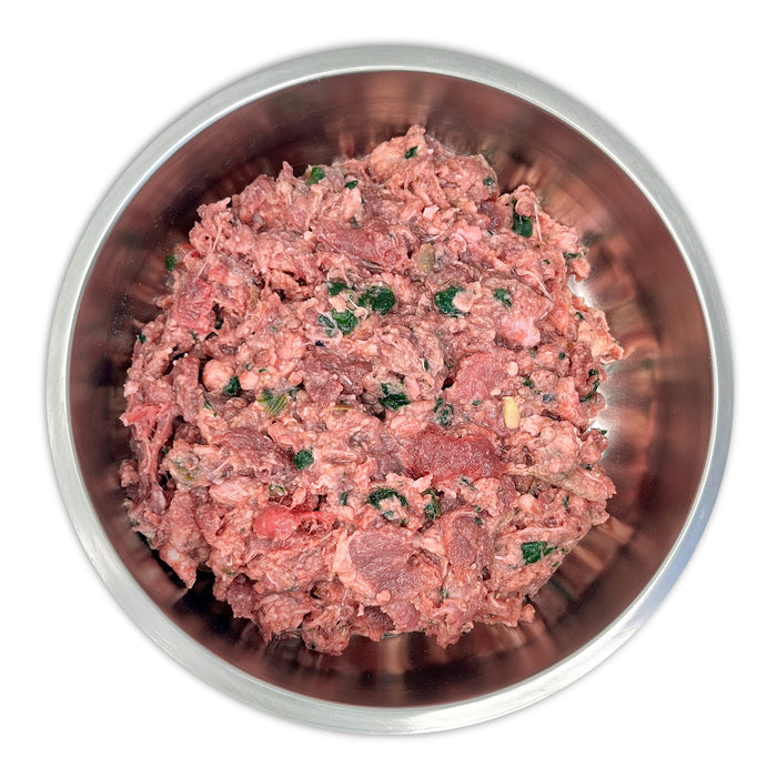 Big Country Raw XL Red stainless-steel bowl with minced meat and herbs, ideal for dogs needing poultry-free, balanced red meat meals.