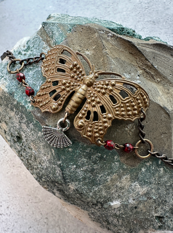 Butterfly bracelet on stone