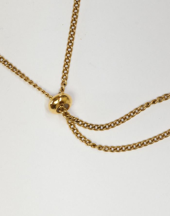 Gold chain necklace slider detail