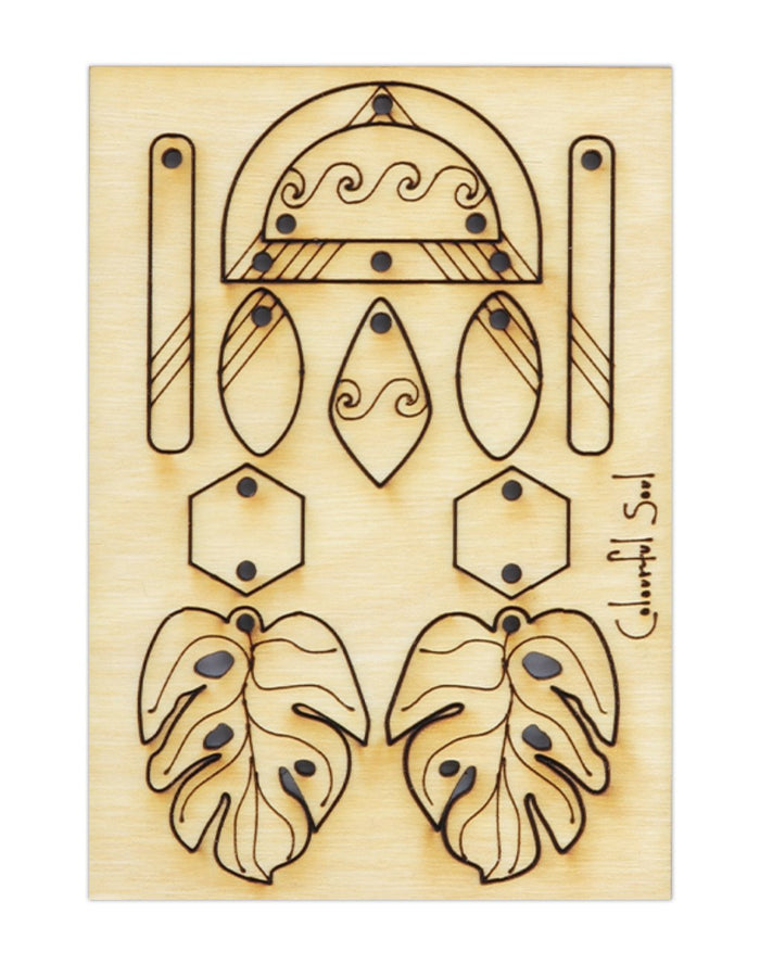Wooden earring die-cut with leaf & geometric designs.
