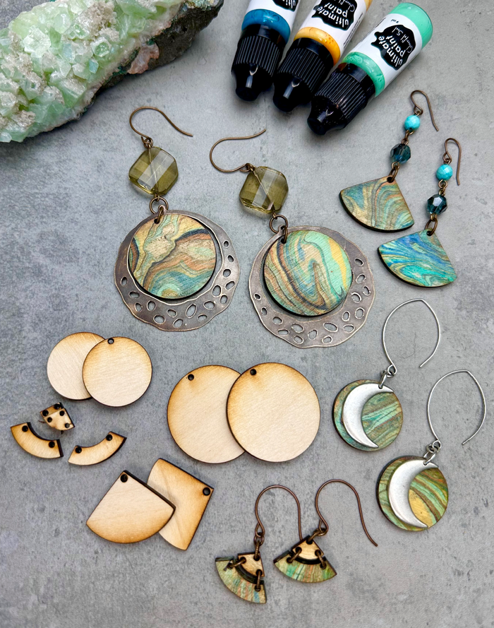 Handmade earrings with BCFD96EE-7826-4B5E-B725-532ADC0FFB39 details.
