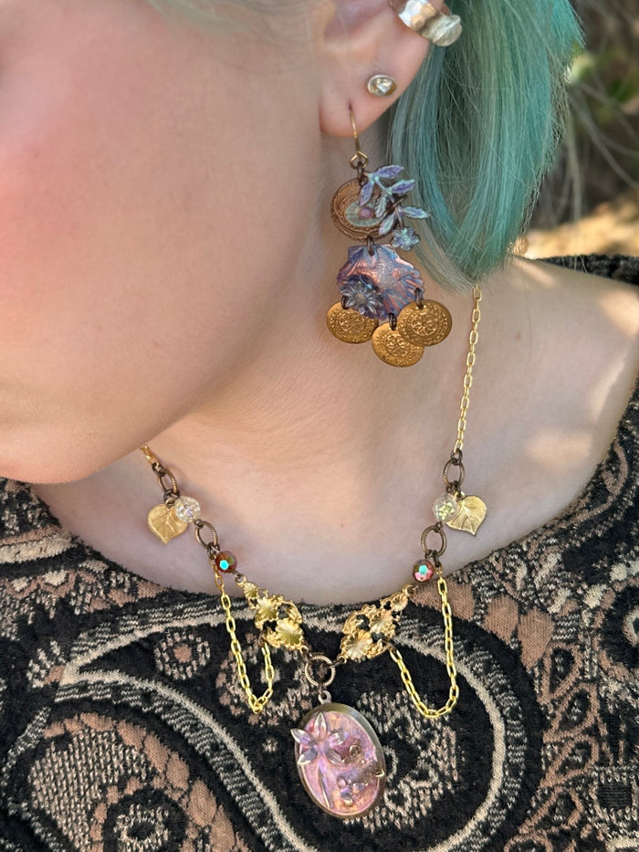 Woman wearing ornate jewelry.