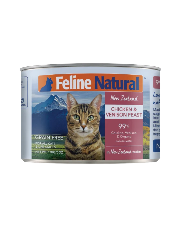 Feline Natural Canned Food for Cats, Chicken & Venison Feast in a 170g can showing a tabby cat with mountainous background, highlighting grain-free, high-meat content.
