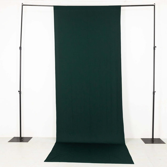 Green backdrop fabric on a stand for photography