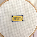 Inspirational "Believe" Poster Needle Minder