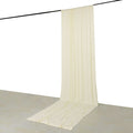 Cream fabric backdrop draped elegantly for photography use