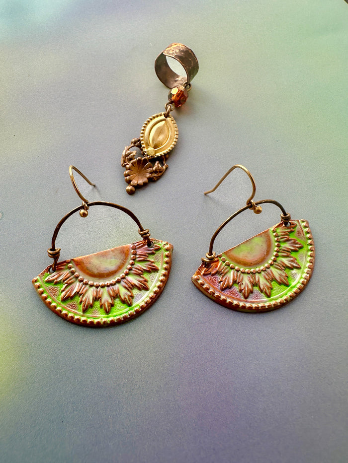 pendant and two fan-shaped earrings.