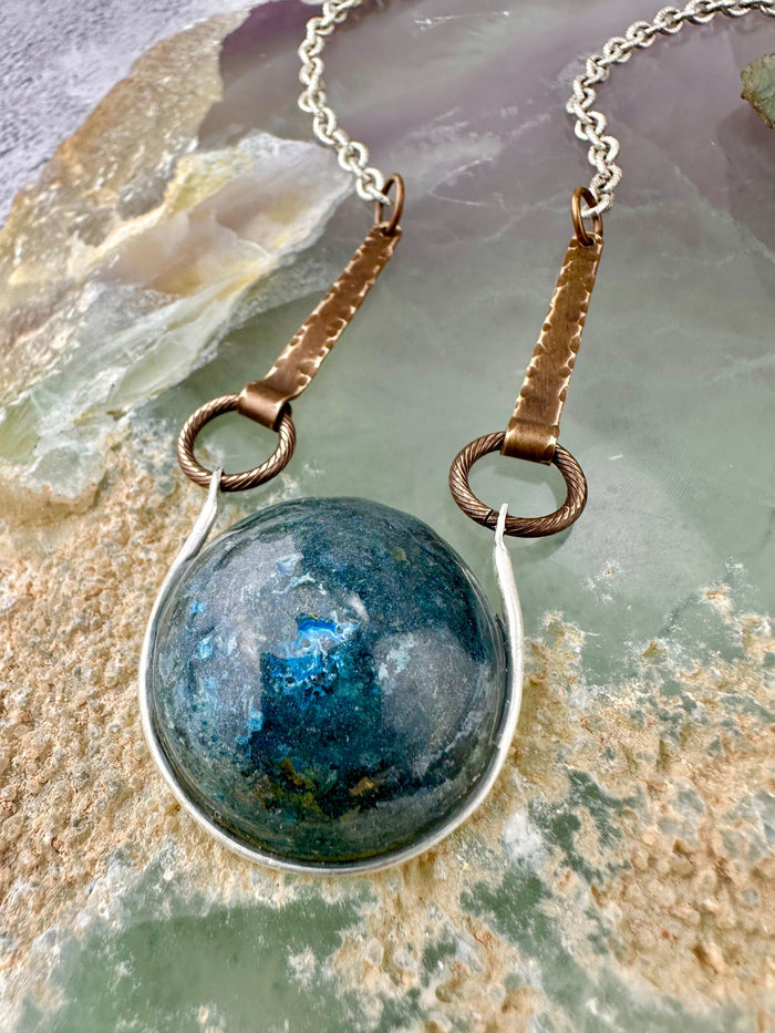 Blue sphere pendant necklace