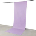 Purple fabric backdrop hanging vertically in studio setting