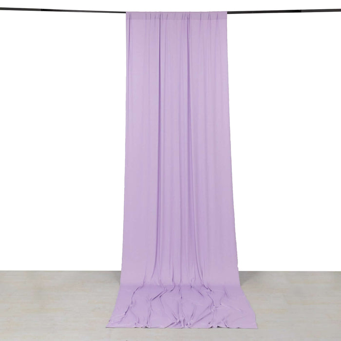 Lavender backdrop fabric hanging elegantly from a rod