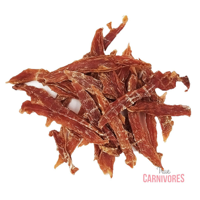 One Ingredient Dehydrated Duck Breast Fillet 100g, showing a small pile of lean, dehydrated duck strips, ideal for sensitive pets, crafted in Canada.