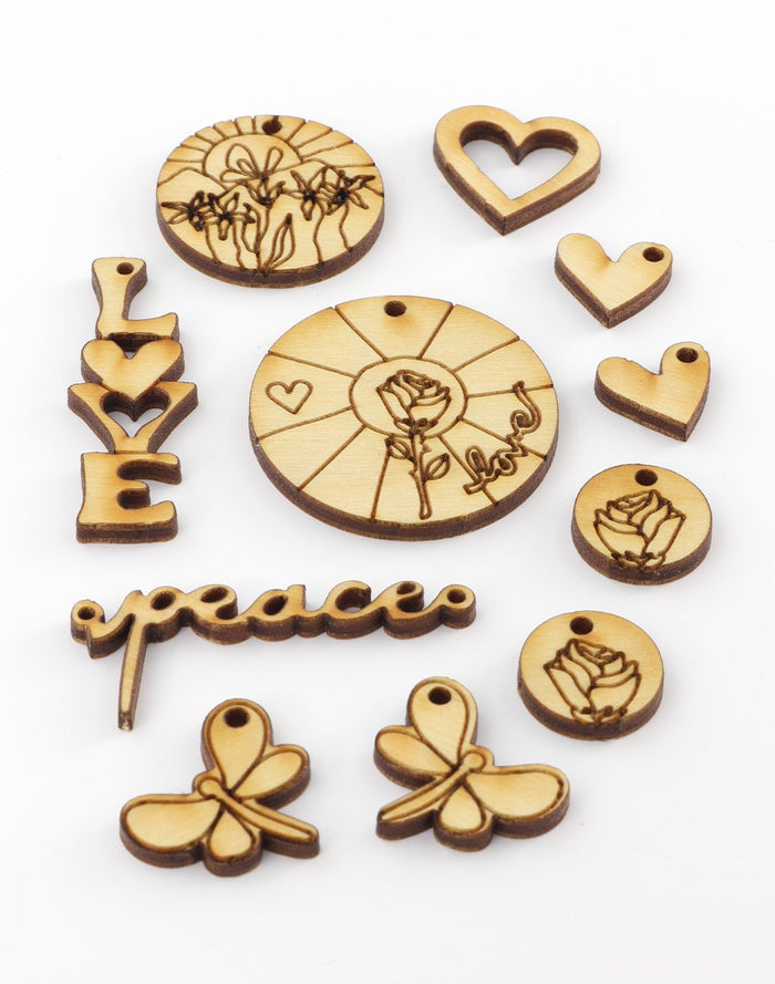 Wooden charms with flowers, hearts, and words