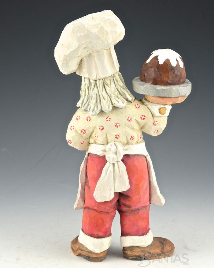 Russell Scott Chef Santa carving with Plum Pudding