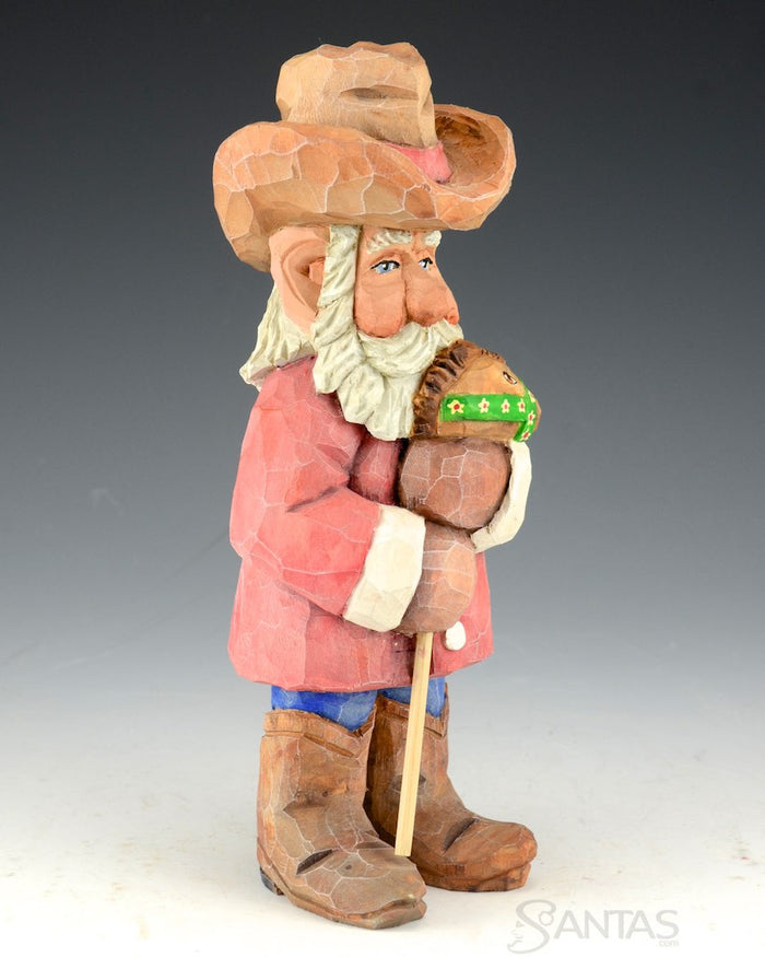 Russell Scott Cowboy Santa with Stick Pony