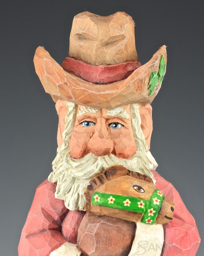 Russell Scott Cowboy Santa with Stick Pony