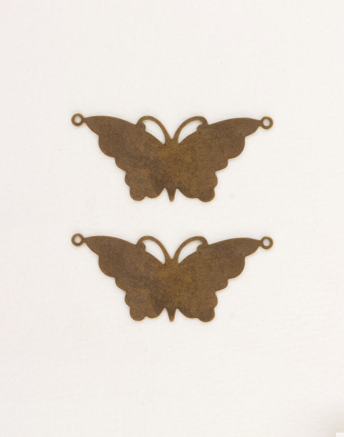 Two bronze butterfly charms for jewelry making.