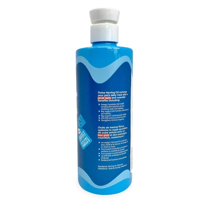 Thrive Herring Oil in a tall blue bottle with a flip-top cap, featuring benefits like Omega-3 support for pets' skin, coat, and overall health.