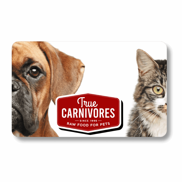 Gift card banner with True Carnivores – Raw Food for Pets – Since 1996 badge, flanked by a dog and cat, promoting pet-food e-gift cards.